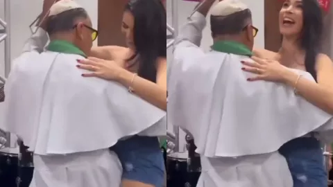 Captan a sacerdote bailando bachata con una mujer