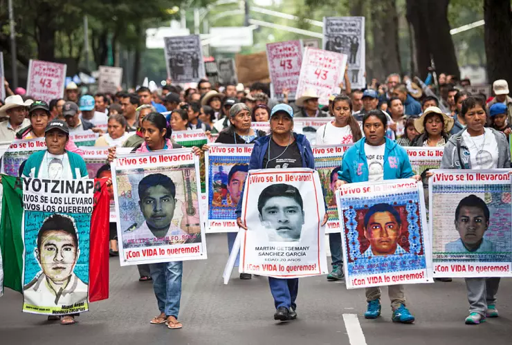 Protest In Mexico City Marks One Year Anniversary Of Missing Students