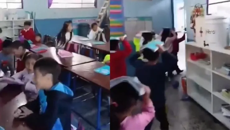 Maestro calma a niños por sismo en escuela de Guatemala