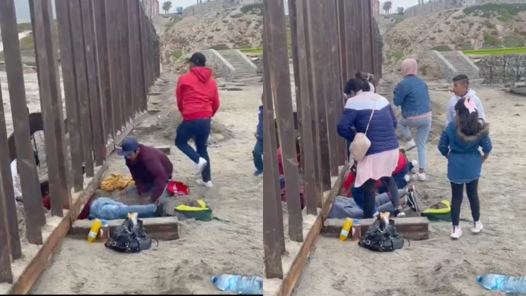 VIDEO: Migrantes escarban arena para cruzar la frontera en Tijuana
