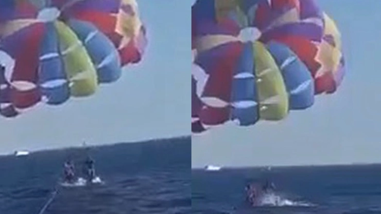 tiburón muerde paracaidista