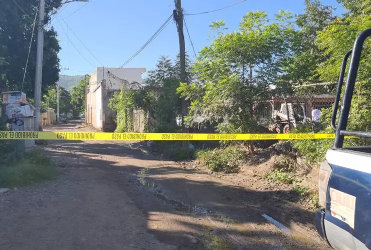 Hombre asesinado con un sombrero en la cara en Culiacán.jpg