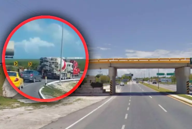 Tráiler genera tráfico en el puente del Aeropuerto de Cancún por caída de material HOY jueves 3 de abril.jpg