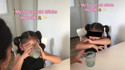 Niña toma leche materna