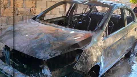 FOTOS_ Dentro de un taller, un auto se incendió en calles de Tizimín