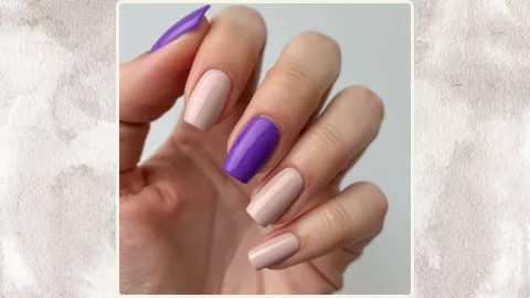Uñas con acento en morado neón