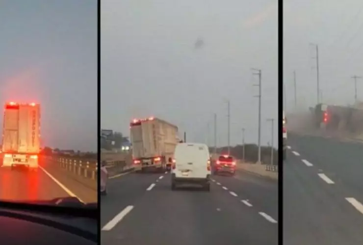 Tráiler embiste a camioneta y termina volcado