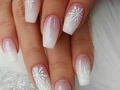 10 ideas de uñas copo de nieve para presumir en Navidad