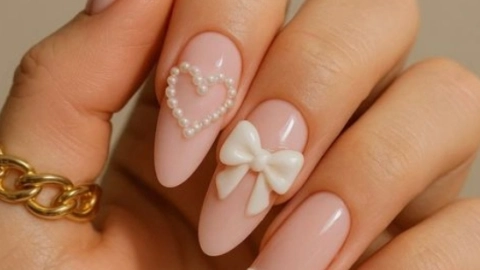 estilos de uñas con moños
