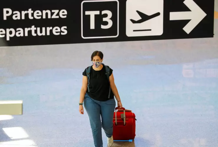 covid 19 viajeros.jpg