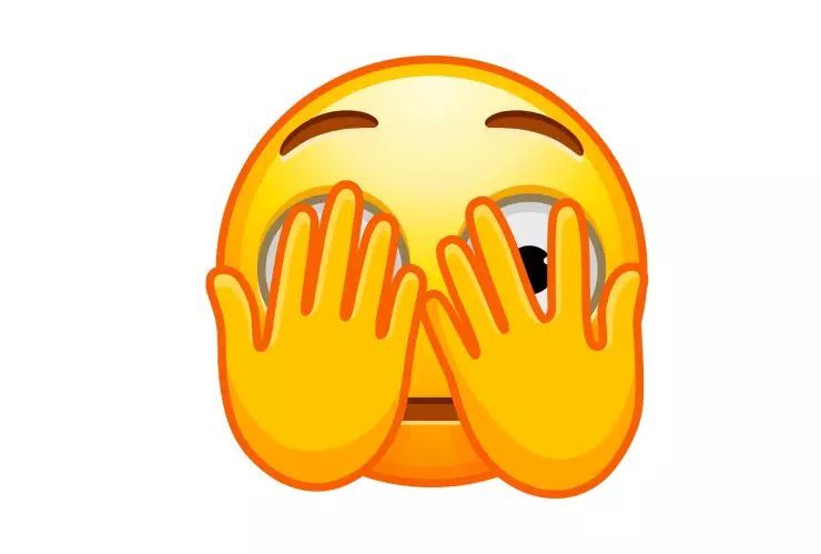 Emoji mirando a escondidas
