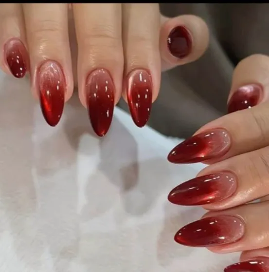 Uñas acento ojo de gato rojo