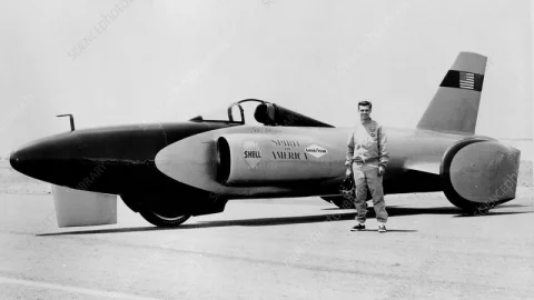 Craig Breedlove with Land Speed Record car, c1963