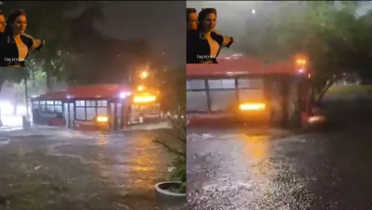 Camión atraviesa inundación