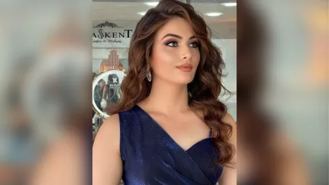 peinados para mujeres con el pelo ondulado raya de lado