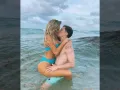 Lele y Guaynaa en el mar.jpg