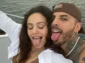 Rauw y Rosalia sacando la lengua.jpg