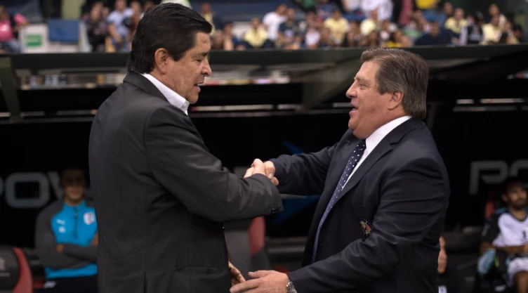 Luis Fernando Tena y Miguel Herrera
