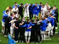 Los jugadores de Eslovenia se reunen para comenzar los tiempos extra.jpg
