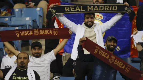 Aficionados del Real Madrid y Barcelona