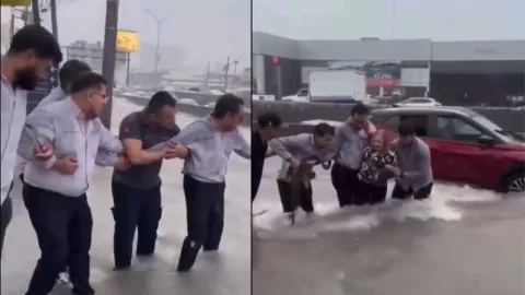 Lluvias en Monterrey: Cadena humana de empleados rescata a conductora de la tercera edad de las inundaciones