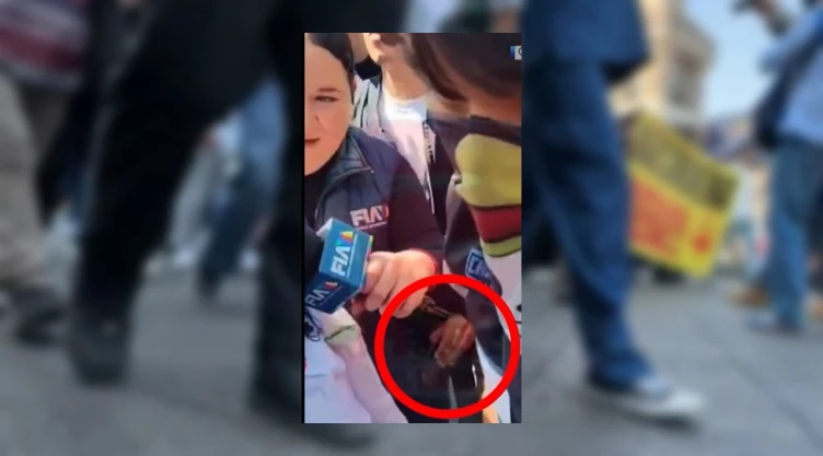 robo celular reportera marcha generacion z.jpg
