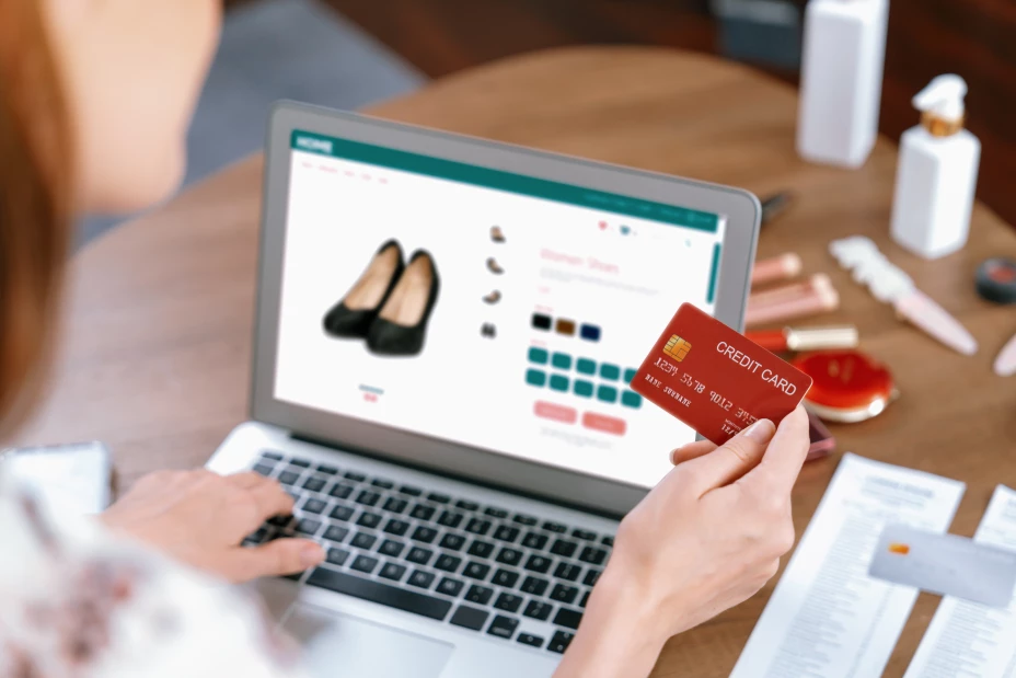 Woman shopping online on internet marketplace browsing for utmost sale items