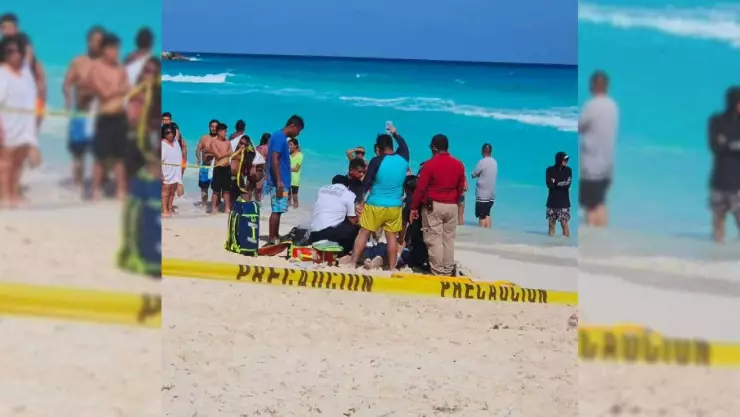 ¡Trágico momento! Hombre muere ahogado cuando nadaba con sus dos hijos en Cancún