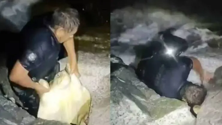 VIDEO: Captan rescatan de tortuga atrapada entre rocas durante tormenta en Cabo San Lucas
