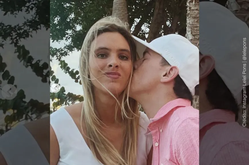 Lele y Guaynaa beso.jpg