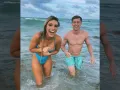 Lele y Guaynaa playa.jpg