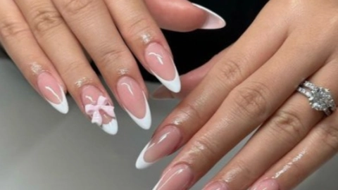 modelos de uñas con moños