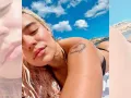 Karol G en la playa.jpg