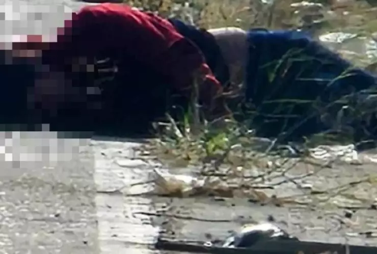 Migrante muro fronterizo de Tijuana