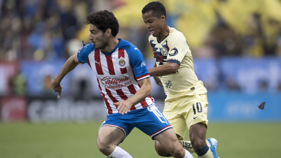 Giovani dos Santos y Antonio Briseño