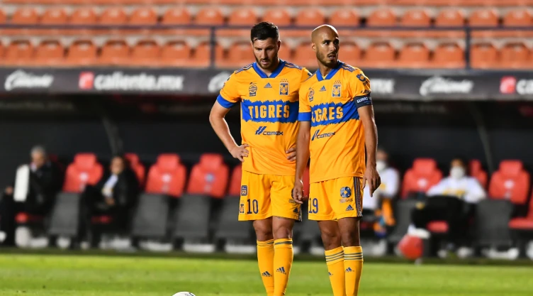 Guido Rodríguez y André Pierre Gignac