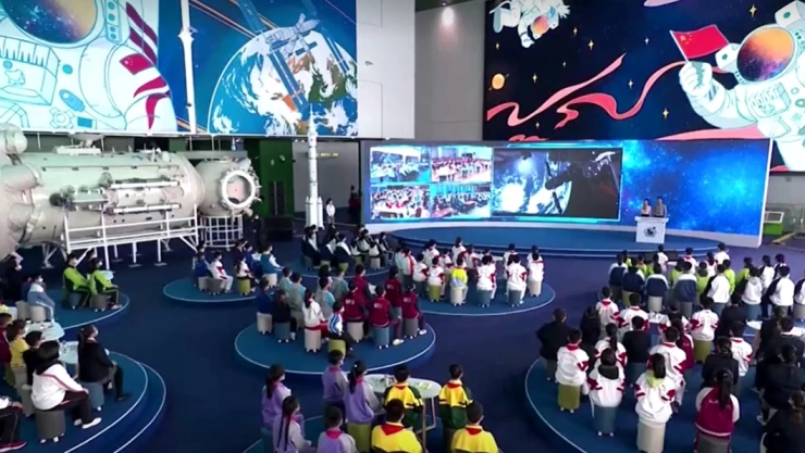 Astronautas China clase desde el espacio