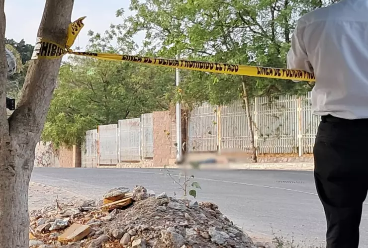 Hombres asesinados en Parque 97