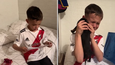 Niño regalo perrito