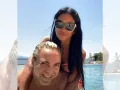 Mariela Sánchez y Christian Castro en la playa.jpg