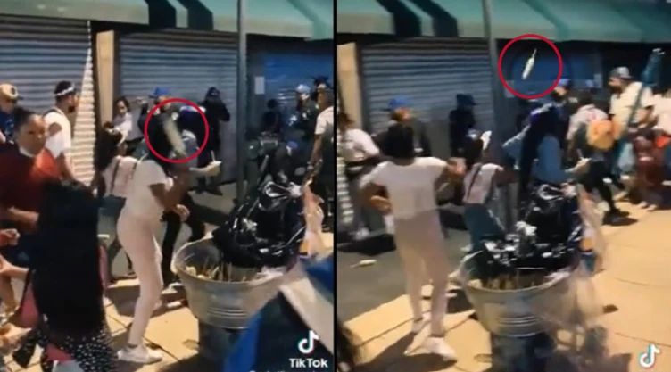 elote comerciante policías pelea.jpg