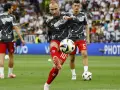 Christian Eriksen calentando previo a su partido en contra de Alemania.jpg