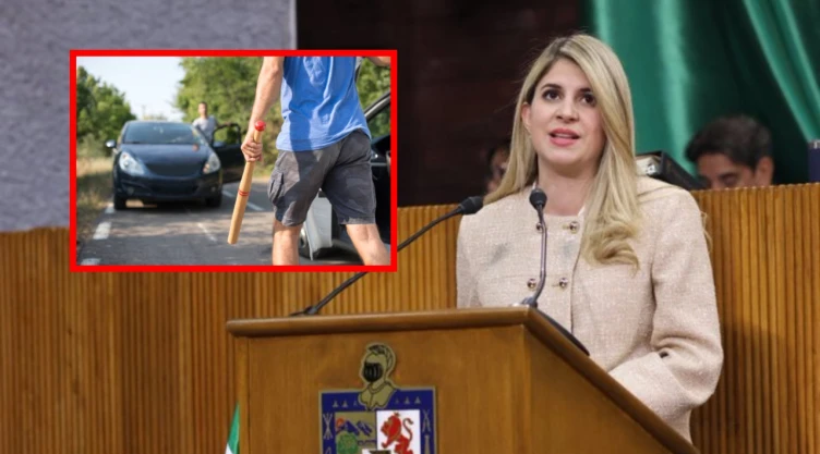 Una mujer rubia con cabello largo y liso, vestida con un blazer de color beige claro o crema, identificada como la diputada Melisa Peña, está de pie detrás de un podio de madera oscuro. En el podio, se ve un escudo de armas con un león rampante y otros símbolos. Hay un micrófono frente a ella, y parece estar hablando o dando un discurso. Detrás de ella, se aprecia una pared de listones de madera y, al fondo, se divisan algunas personas borrosas, una bandera de México y una cortina verde, sugiriendo un entorno oficial o gubernamental en el Congreso de Nuevo León.