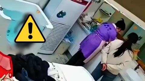 El incidente ocurrió en una lavandería y fue registrado por cámaras de seguridad